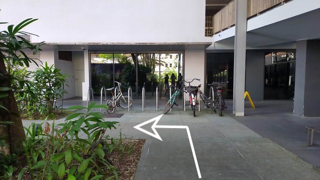 Turn left upon seeing the bicycle parking facility