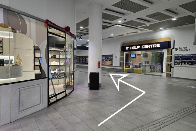 Turn left past IT Help Centre. Walk on and take the escalator up