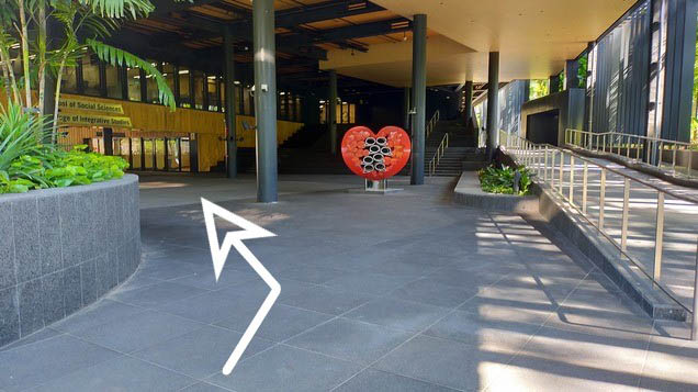 Turn left following the arrow and take the stairs down