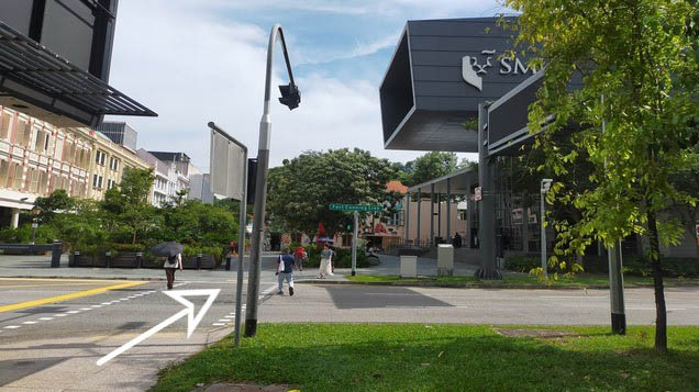 Cross the road towards Yong Pung How School of Law