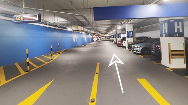 Drive straight and look for Lift Lobby A