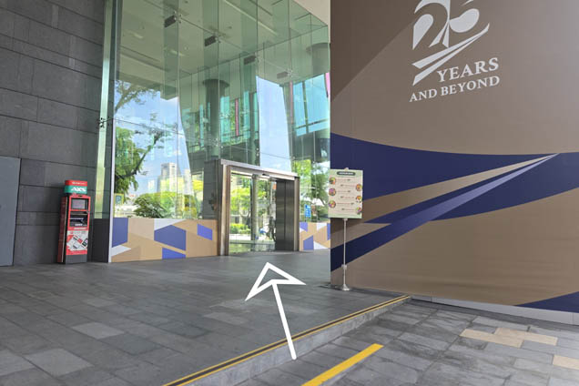 Proceed through the SMU Administration Building glass doors