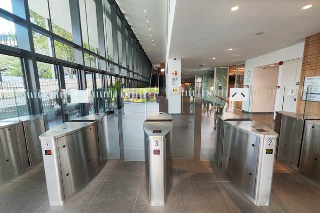 2.1. Proceed through the gantry and take the escalator up to Level 2