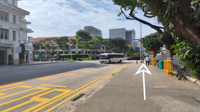 2. Turn right and walk towards the traffic light