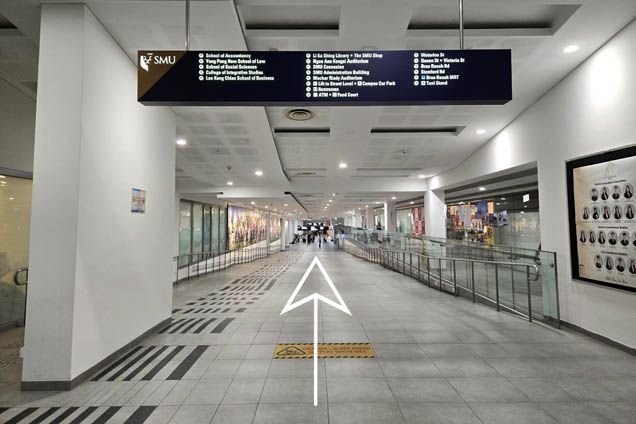 4. Walk down the ramp and continue straight