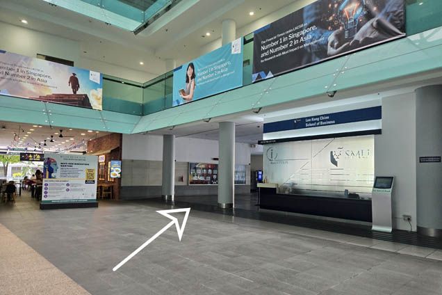 8. Turn right again and follow the arrow towards the pillar